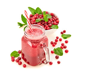 Cranberry smoothie in glass jar, healthy juicy pink vitamin drink, diet or vegan food concept. Freshly blended homemade fruit vitamins refreshing juicy cocktail. Tasty organic berries smoothie