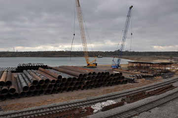 metal pipes in the port. Storage of metal faceted pipes