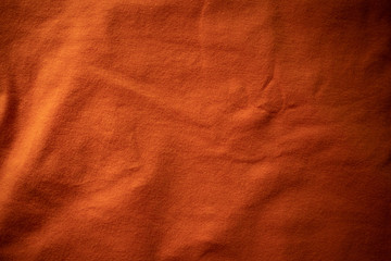 Orange Textile Background. Dark Cotton Backdrop.