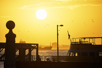 Fototapeta na wymiar Shot of the port in sunset in Lisbon Portugal