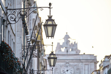 Lamp in Lisbon Portugal with Arco da Rua August on background