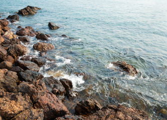 Sea landscape. Evening on the stone beach.