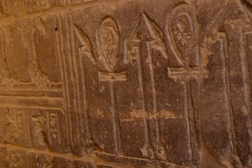 Hieroglyphic writing on temple walls