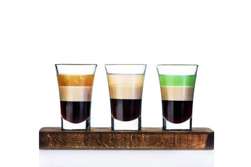 set of three shots over a white background