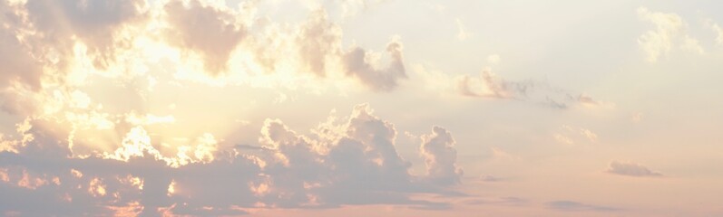 beautiful orange and blue sky with clouds at the sunrise with sun ray look like heaven