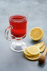 Hot raspberry tea with ginger and lemon