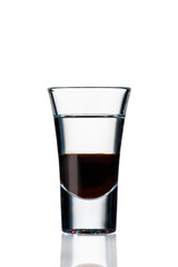alcoholic cocktail in a glass on a white background