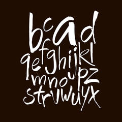 Vector Acrylic Brush Style Hand Drawn Alphabet Font. Calligraphy alphabet on a black background