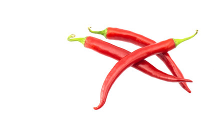 Pods of burning red pepper on a white background