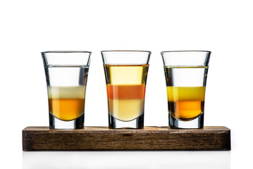 set of three shots over a white background