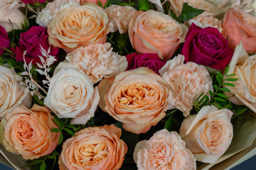 Fresh composition of bright flowers close-up work of florist decorative background