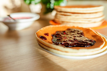 Real food. Pancakes on the table with home flower. Authentic breakfast