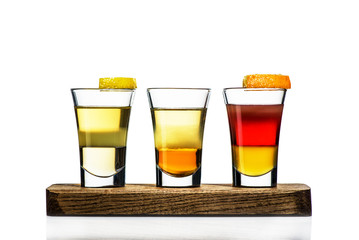 set of three shots over a white background