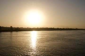 Sunset viewed from across a river