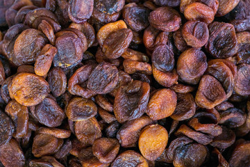 Dried apricots fruit top view texture. Dried apricots. Healthy nutrition, vegetarian natural nutrition. Potash products