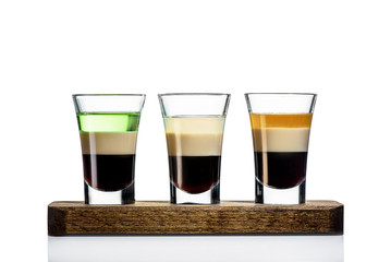 set of three shots over a white background