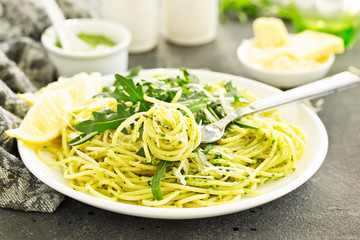 Spaghetti with arugula pesto. Selective focus.