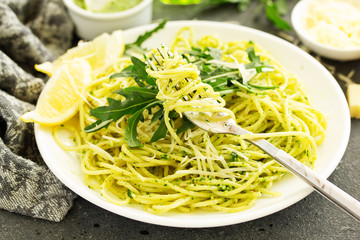 Spaghetti with arugula pesto. Selective focus.