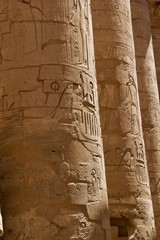 Egyptian temple structures with hieroglyphics