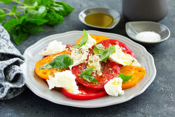 salad of tomato, mozzarella and basil. Italian food.