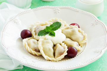 Dumplings with cherries. Ukrainian and Belarusian cuisine.