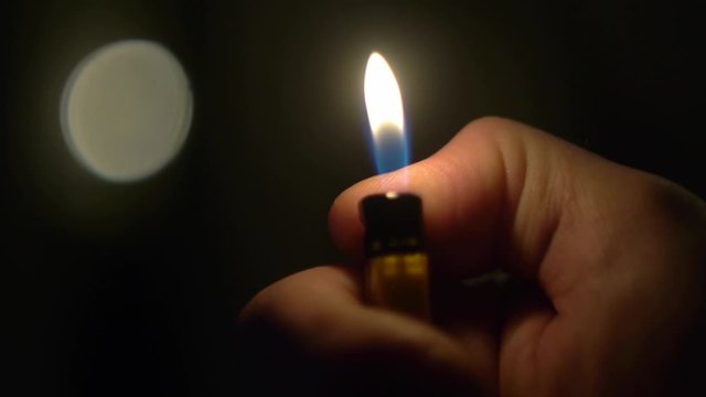 Lighter flame in the dark
