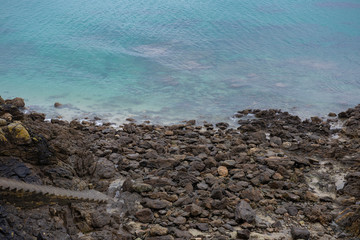 France. Bretagne. Rocky seaside with a staircase. Bord de mer rocheux avec un escalier.