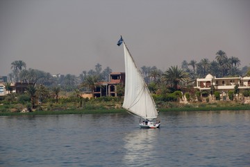 Sail boat on a river