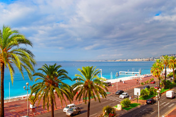 English promenade at Nice, France in summer. Bay and beach view