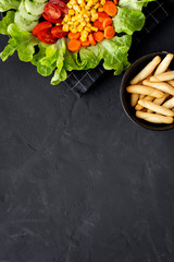 lettuce salad with tomato, cheese and vegetables