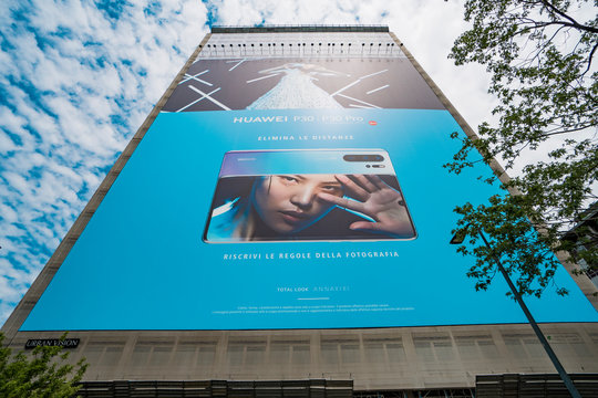 Giant advertising billboard for the promotion of the P30 and P30 Plus, the new smartphones from Huawei in Milan, Italy - May 26, 2019