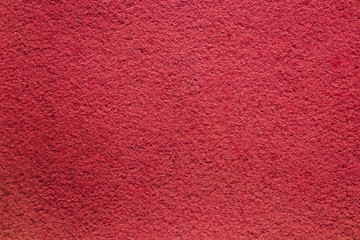 Colored bright felt textile material. red color composition. Colorful felt texture for background with copy space. Felt fabric sheet