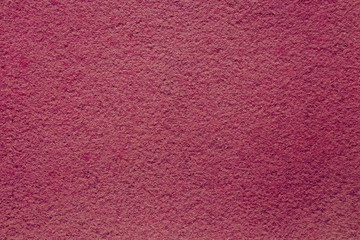 Colored bright felt textile material. red color composition. Colorful felt texture for background with copy space. Felt fabric sheet