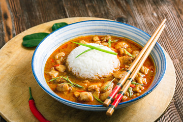 Delicious spicy Thai chicken food with curry and rice