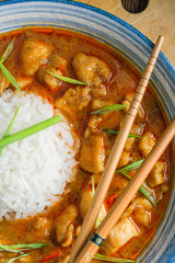 Delicious spicy Thai chicken food with curry and rice