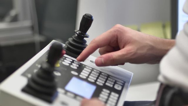 Professional Quality Engineer controls the Modern 3D Measuring Machine Fully-Automatic CNC using the Controller, Inspection, Measurement of Plastic Moldings Dimension in Automotive, Close up