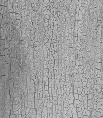 Cracked paint on wooden background, texture. Vintage wallpaper