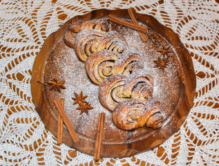 Homemade Cinnamon Roll served on the wooden board