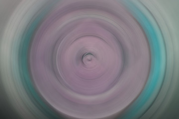 Abstract round background. Circles from the center point. Image of diverging circles. Rotation that creates circles.
