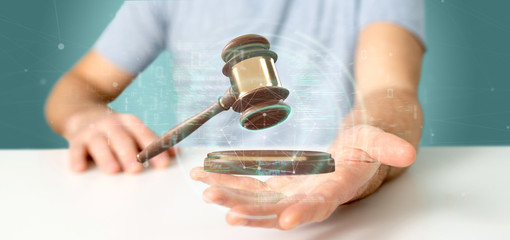 Businessman holding a Justice hammer and data - 3d rendering