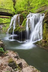 Naklejka na ściany i meble Bigar Cascade Falls in Nera Beusnita Gorges National Park, Romania.