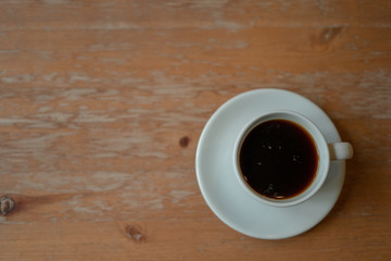 white Coffee cups, crackers, laid on a wooden table  top view and copy space