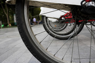 Bicycle rental in the central mall of Mexico City. Group of bicycles taken from the tires, near Fine Arts. Promotion of an ecological life