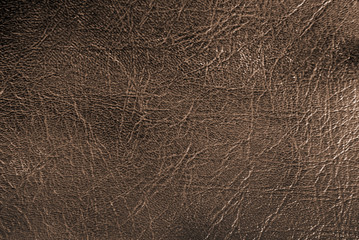 dark leather background in vintage style, dust and scratches