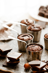Homemade delicious dark chocolate  fondant cakes. Served in vintage ladles. Delicious elegant dessert for sweet-tooth, sweet breakfast. Romantic atmosphere, aromatherapy. Close up, macro