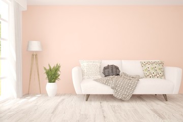 Minimalist room in pink color with sofa. Scandinavian interior design. 3D illustration