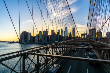 Skyline of lower manhattan, new york, shot from the brooklyn brigde during sunset