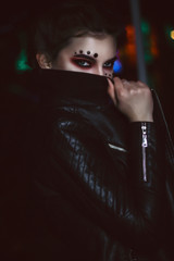 young woman in night city