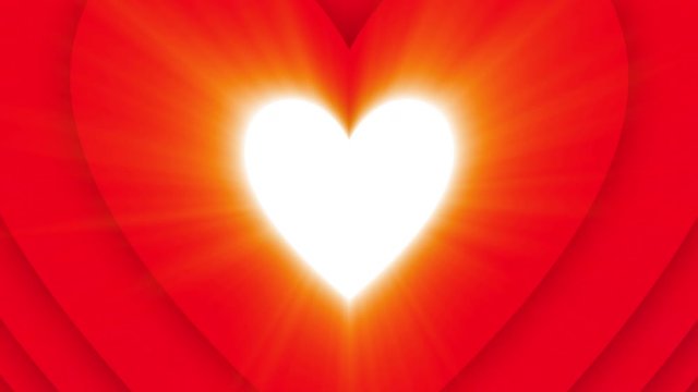 Blazing shining Valentine's Day heart on red background. Looped animation.