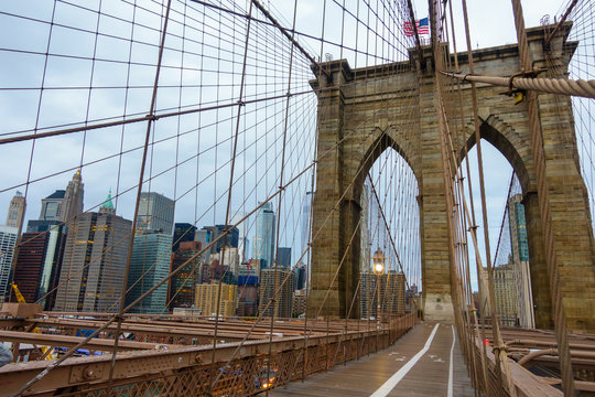 People Walking In Brooklyn Bridge At Day Time